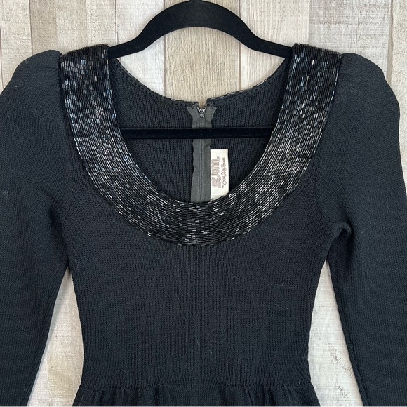 St. John Dresses & Skirts - Vintage ST JOHN Lillie Rubin Black
Santana Puff Sleeve Beaded Trim Evening
Dress